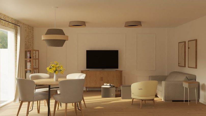 Sala moderna con sofá, mesa, sillas y televisor, iluminada con luz natural.